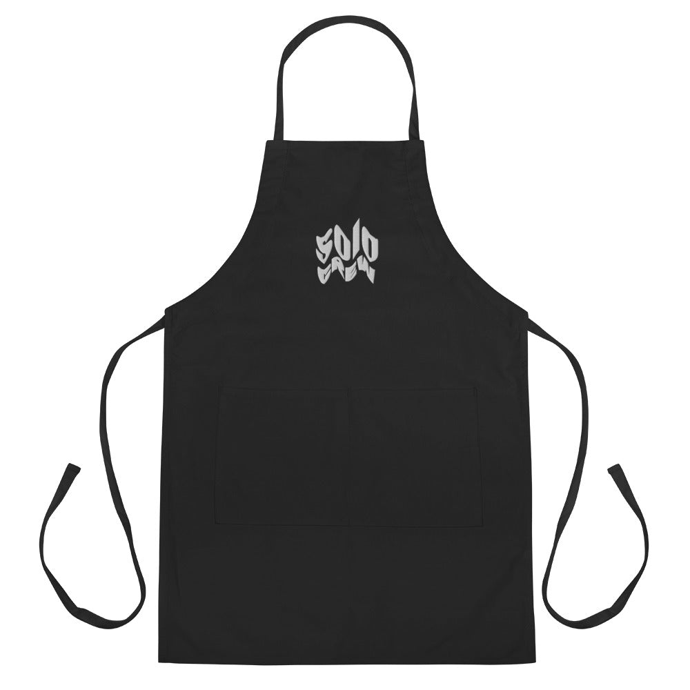 Solo Crew embroidered apron by Robin Gnarly — black, front